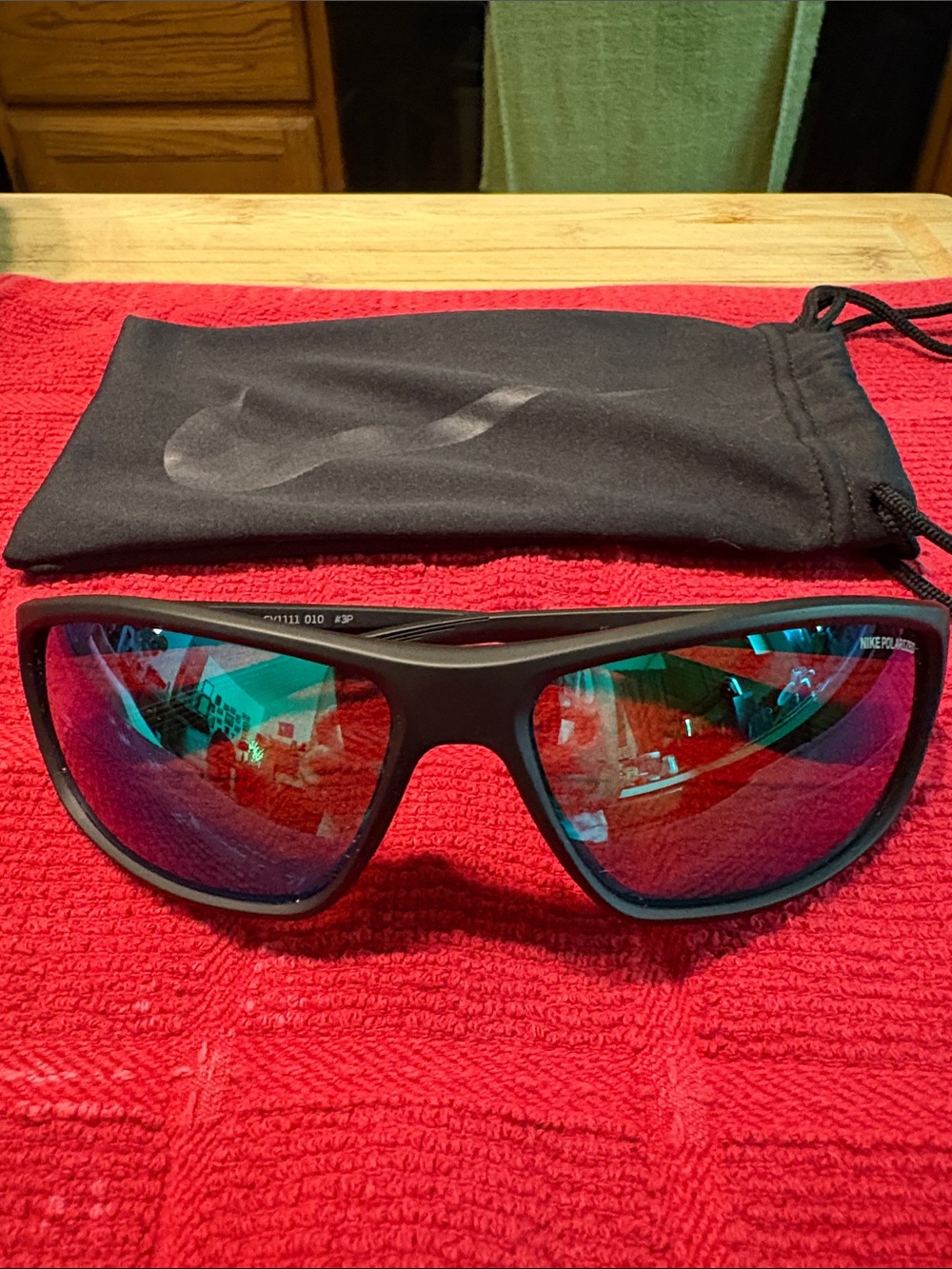 Nike Black Frame Sunglasses with Green Mirrored Lenses